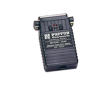 1040UM - RS-232 Async/Sync self powered line driver; DB25M; surge protection; universal line (TB,RJ45/RJ11 combo jack) by PATTON